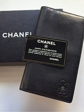 CHANEL Black Camellia Embossed Leather Wallet